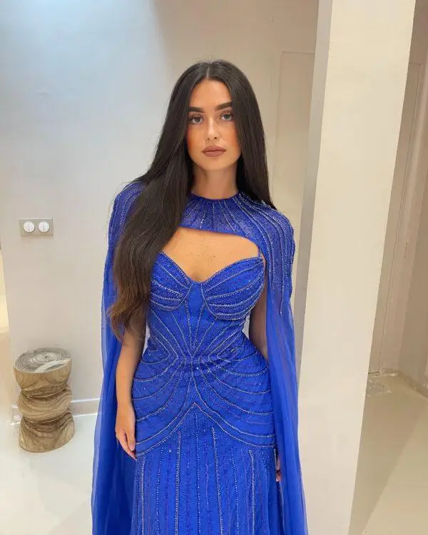 Blue beaded mermaid evening dress with cape