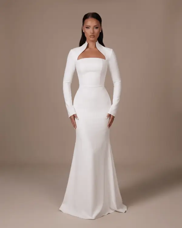 White minimalist mermaid wedding dress with an open stand-up collar, square neckline, long sleeves, and a train – Hannachi Couture Paris