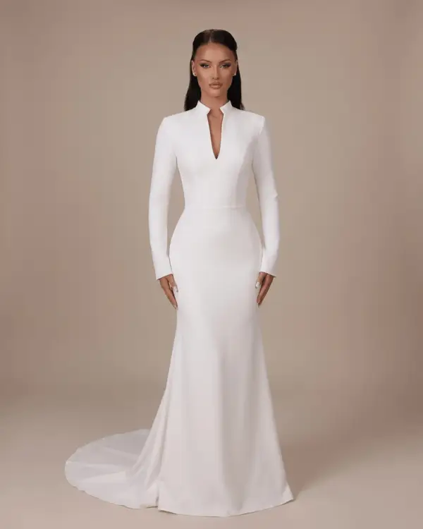 Robe de mariée sirène minimaliste blanche à col montant, décolleté en V et manches longues – Hannachi Couture Paris